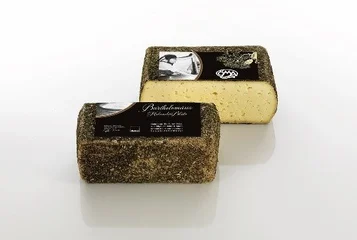 ÖMA BARTHOLOMÉ AUX FLEURS DE SUREAUemi-dure - service arrière Fromage bio pate demi-dure - service arrière
